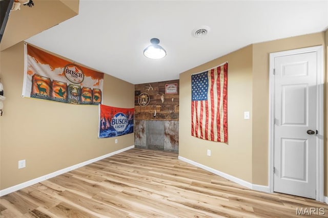 7742 Ardmore Dr, Ofallon, MO 63368 - unfurnished room featuring wood finished floors and baseboards