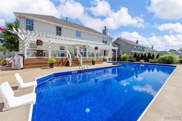 7742 Ardmore Dr, Ofallon, MO 63368 - outdoor pool featuring a pergola, a patio area, and a wooden deck