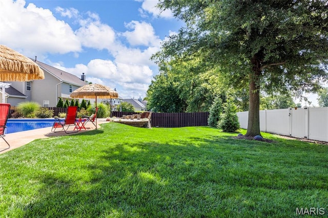 7742 Ardmore Dr, Ofallon, MO 63368 - fenced backyard with a patio area