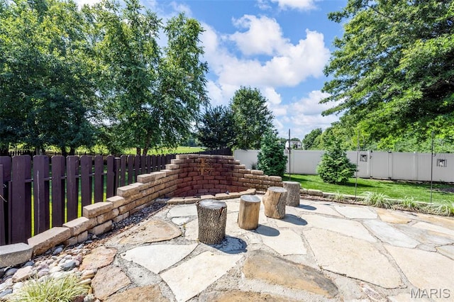 7742 Ardmore Dr, Ofallon, MO 63368 - fenced backyard with a patio