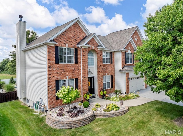 7742 Ardmore Dr, Ofallon, MO 63368 - view of front of home with a chimney, brick siding, a garage, and roof with shingles