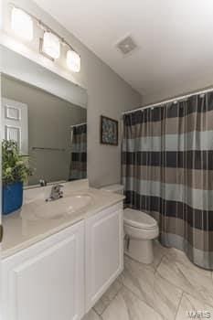 1405 Sunburst Dr, O'Fallon, MO 63366 - bathroom featuring vanity, marble finish flooring, and a shower with curtain