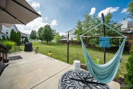 1405 Sunburst Dr, O'Fallon, MO 63366 - view of patio / terrace featuring a grill