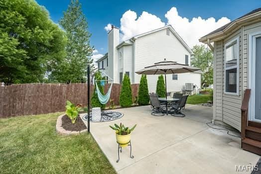 1405 Sunburst Dr, O'Fallon, MO 63366 - view of patio with outdoor dining space