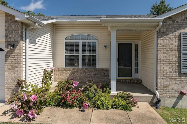 563 Great Plains Dr, House Springs, MO 63051 - property entrance featuring brick siding and a porch