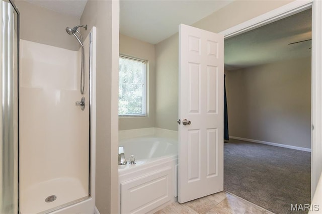 563 Great Plains Dr, House Springs, MO 63051 - bathroom with a stall shower and a garden tub