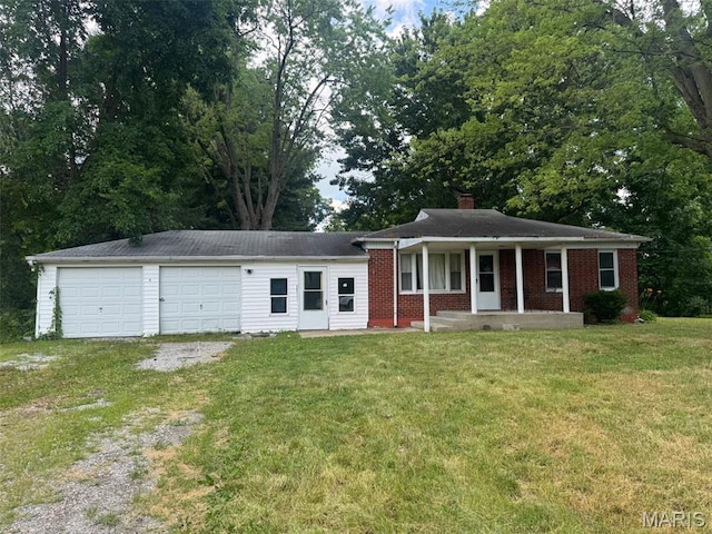 6 Maple Dr, Caseyville, IL 62232 - ranch-style home with covered porch, driveway, a front yard, and a chimney