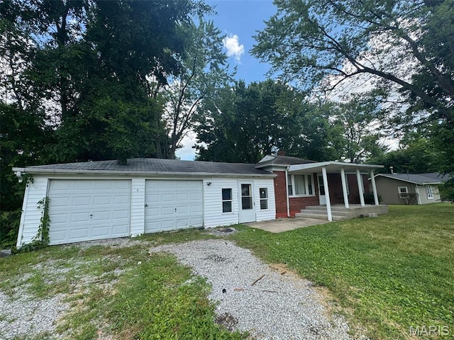 6 Maple Dr, Caseyville, IL 62232 - ranch-style house with a porch, gravel driveway, a front lawn, and a chimney