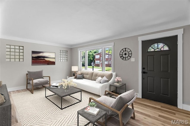 6736 Julian Ave, University City, MO 63130 - living area featuring light wood finished floors and baseboards