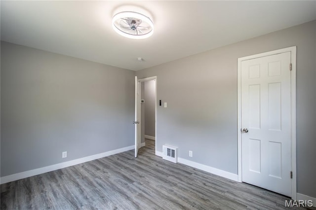1900 Owen Dr, Hanley Hills, MO 63133 - spare room featuring wood finished floors and baseboards
