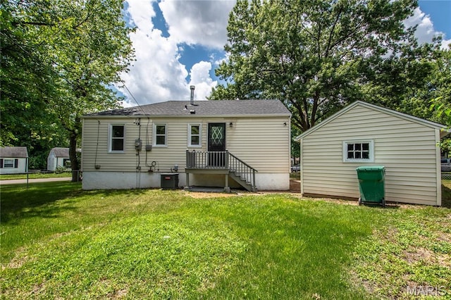 1900 Owen Dr, Hanley Hills, MO 63133 - rear view of property featuring a lawn and an outbuilding