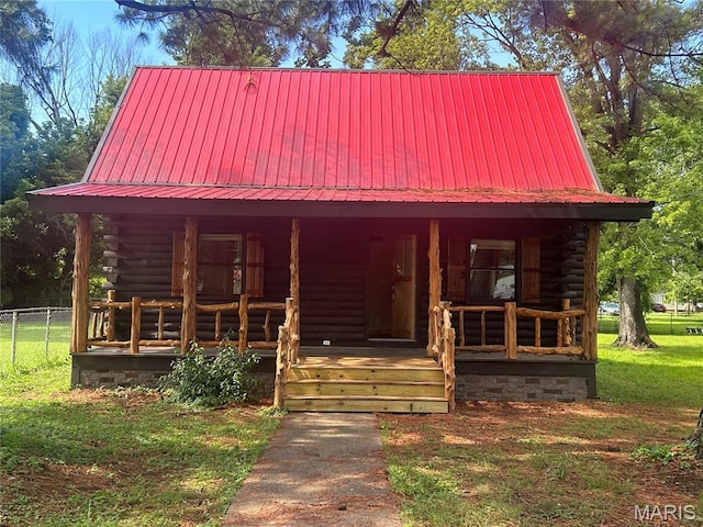 619 Don St, Poplar Bluff, MO 63901 - cabin with a porch, log exterior, and a metal roof