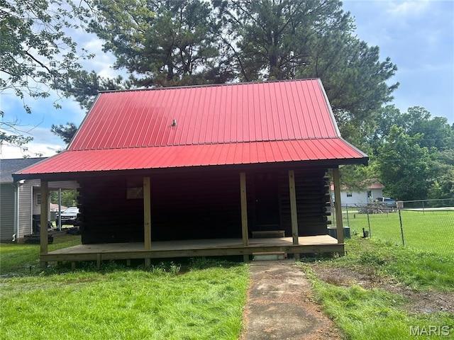 619 Don St, Poplar Bluff, MO 63901 - view of front of house with log siding and a metal roof
