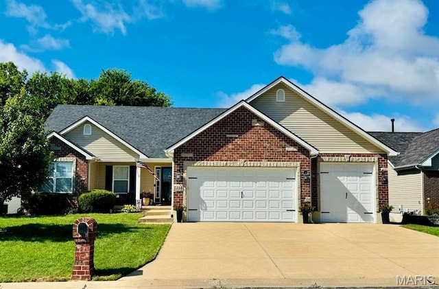 2354 Fountain Dr, Barnhart, MO 63012 - view of front of home with brick siding, an attached garage, driveway, a front yard, and a shingled roof