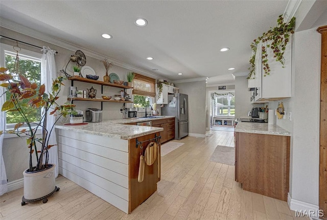 10317 Mallard Rd, Potosi, MO 63664 - kitchen with stainless steel refrigerator with ice dispenser, ornamental molding, open shelves, a peninsula, and recessed lighting