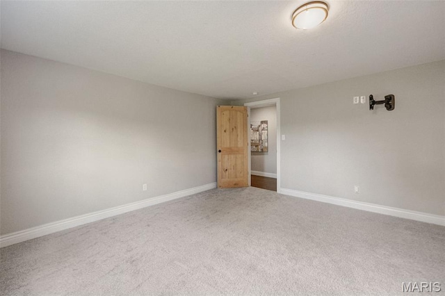 10317 Mallard Rd, Potosi, MO 63664 - carpeted empty room with baseboards