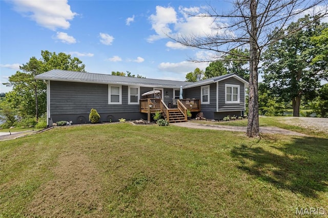 10317 Mallard Rd, Potosi, MO 63664 - view of front of house featuring a wooden deck, a metal roof, and a front yard