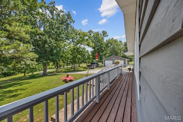 10317 Mallard Rd, Potosi, MO 63664 - deck with an outdoor structure, a garage, a yard, and view of scattered trees