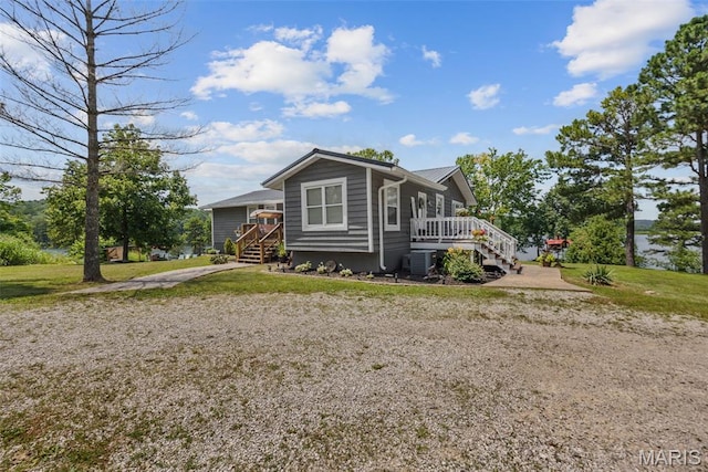 10317 Mallard Rd, Potosi, MO 63664 - view of front of house featuring stairway, a front yard, and covered porch