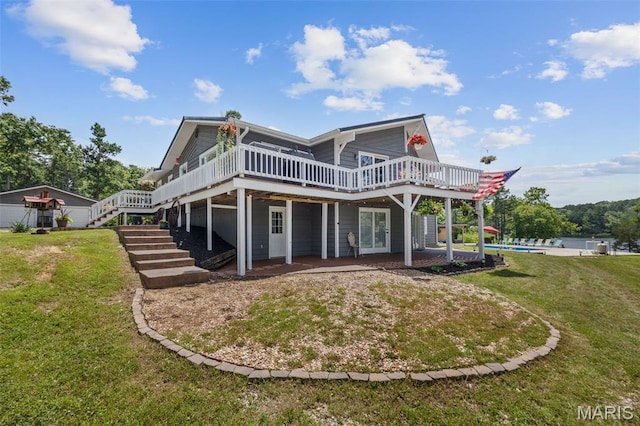 10317 Mallard Rd, Potosi, MO 63664 - rear view of house featuring a wooden deck, a lawn, a patio, and stairway