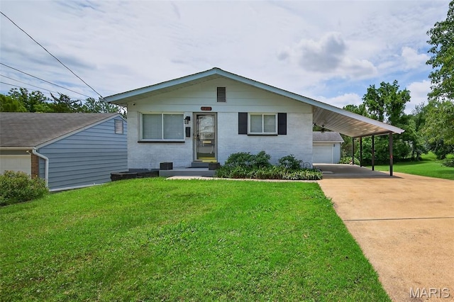 10564 Mert Ave, Saint Ann, MO 63074 - view of front of property featuring a front lawn, driveway, and brick siding