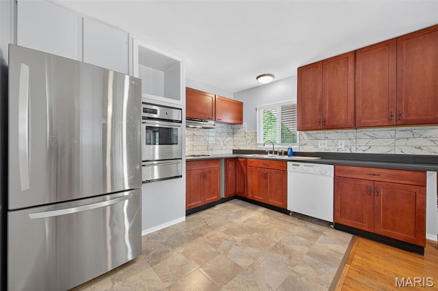 10564 Mert Ave, Saint Ann, MO 63074 - kitchen featuring stainless steel appliances, tasteful backsplash, a warming drawer, and dark countertops