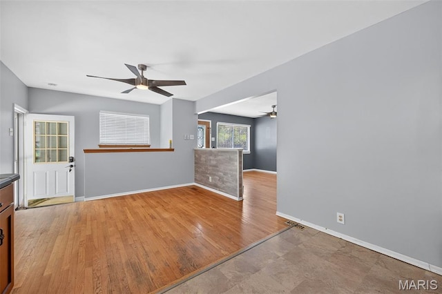 10564 Mert Ave, Saint Ann, MO 63074 - empty room featuring ceiling fan and wood finished floors