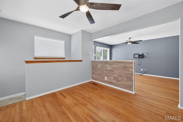 10564 Mert Ave, Saint Ann, MO 63074 - empty room featuring a ceiling fan and wood finished floors