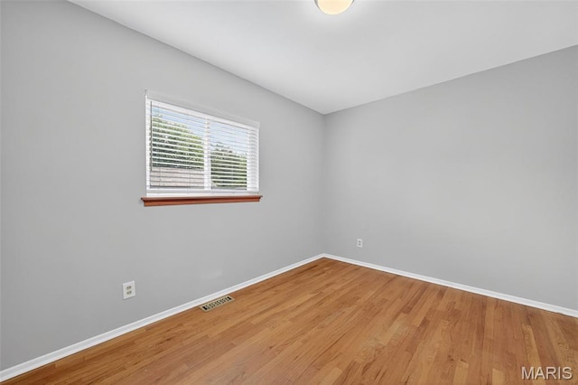 10564 Mert Ave, Saint Ann, MO 63074 - unfurnished room featuring baseboards and wood finished floors