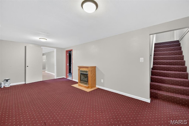 10564 Mert Ave, Saint Ann, MO 63074 - basement featuring carpet floors, a fireplace with flush hearth, and stairway
