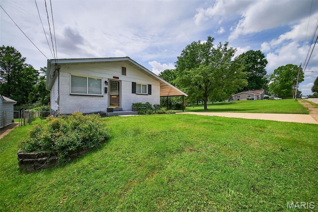 10564 Mert Ave, Saint Ann, MO 63074 - bungalow-style home featuring concrete driveway, brick siding, and a carport