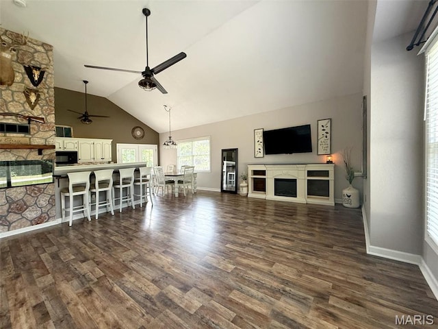 885 Oak Pass Ln, Sullivan, MO 63080 - living area with a fireplace, dark wood-style floors, a ceiling fan, and high vaulted ceiling