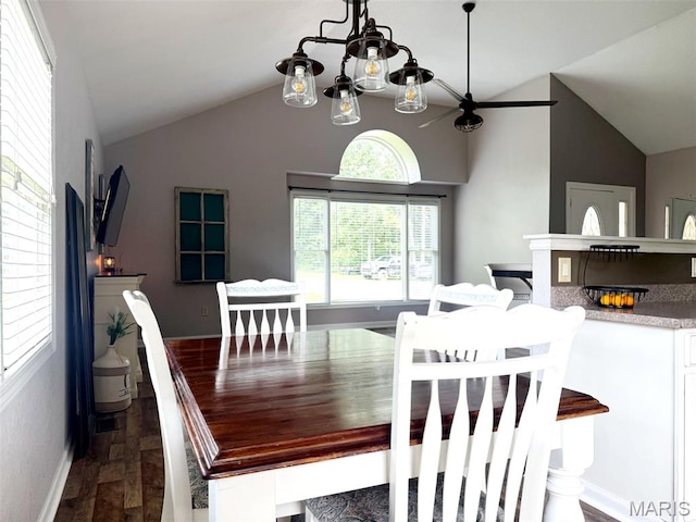 885 Oak Pass Ln, Sullivan, MO 63080 - dining area with lofted ceiling, dark wood-type flooring, and a chandelier