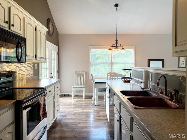 885 Oak Pass Ln, Sullivan, MO 63080 - kitchen featuring stainless steel appliances, vaulted ceiling, tasteful backsplash, dark wood-type flooring, and healthy amount of natural light