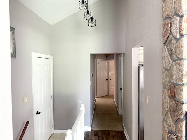 885 Oak Pass Ln, Sullivan, MO 63080 - corridor featuring an upstairs landing, high vaulted ceiling, and wood finished floors
