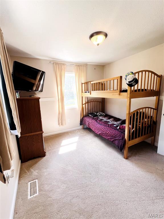 885 Oak Pass Ln, Sullivan, MO 63080 - carpeted bedroom with baseboards