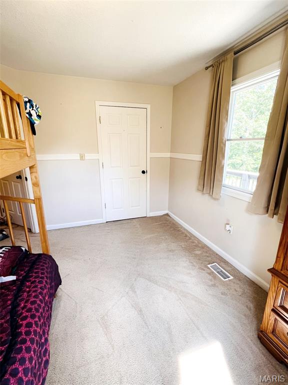 885 Oak Pass Ln, Sullivan, MO 63080 - unfurnished bedroom with carpet flooring