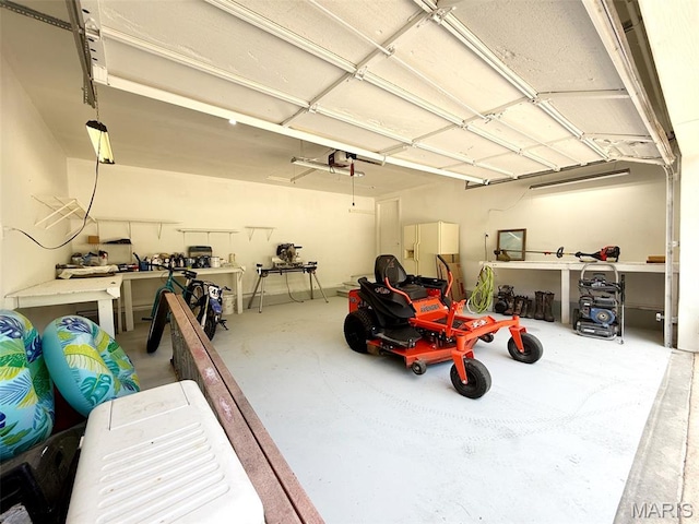 885 Oak Pass Ln, Sullivan, MO 63080 - garage featuring a workshop area and a garage door opener
