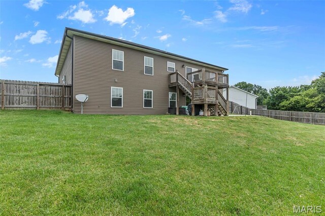 255 Sassenach Dr, Jackson, MO 63755 - rear view of house featuring stairway, a fenced backyard, and a wooden deck