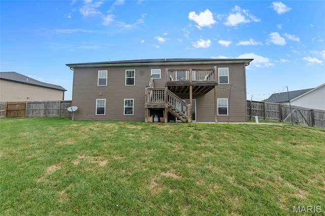 255 Sassenach Dr, Jackson, MO 63755 - back of property featuring stairs, a fenced backyard, and a wooden deck