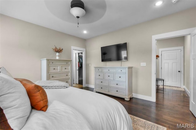 255 Sassenach Dr, Jackson, MO 63755 - bedroom with dark wood-style floors, a walk in closet, recessed lighting, and a ceiling fan