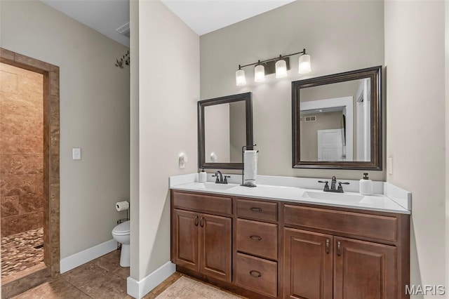 255 Sassenach Dr, Jackson, MO 63755 - full bath featuring double vanity, tiled shower, and tile patterned floors