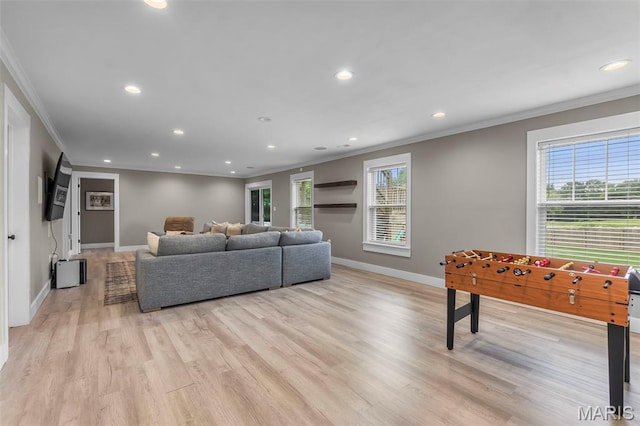 255 Sassenach Dr, Jackson, MO 63755 - living area with crown molding, recessed lighting, plenty of natural light, and light wood-type flooring