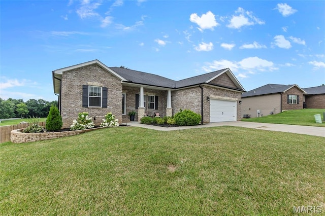255 Sassenach Dr, Jackson, MO 63755 - view of front of home with concrete driveway, a garage, a front yard, brick siding, and covered porch