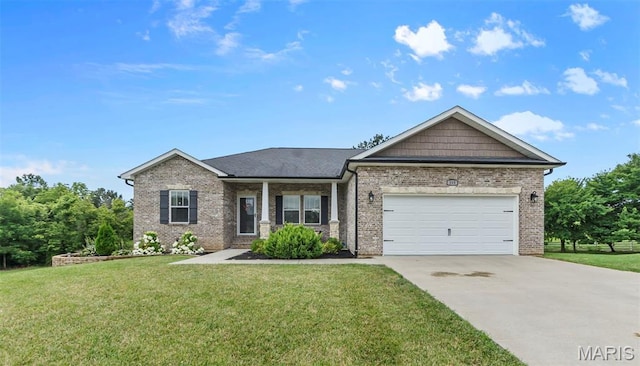255 Sassenach Dr, Jackson, MO 63755 - craftsman-style home featuring a garage, driveway, a front lawn, and brick siding