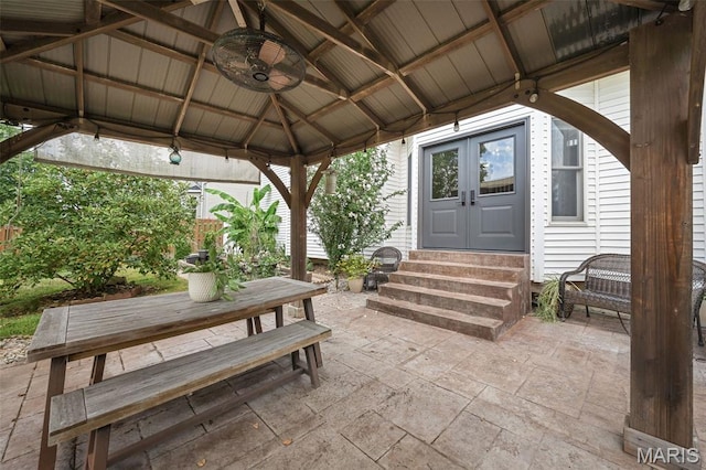 2849 Dardenne Links Dr, Dardenne Prairie, MO 63368 - view of patio with entry steps, a gazebo, french doors, a ceiling fan, and outdoor dining space