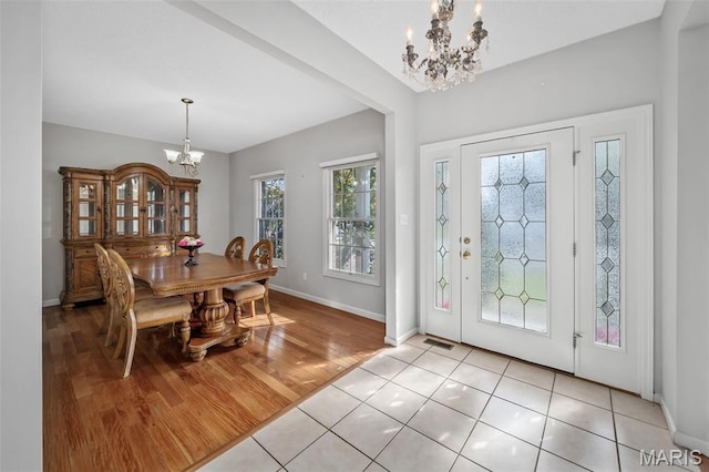 2849 Dardenne Links Dr, Dardenne Prairie, MO 63368 - foyer entrance with a chandelier and light wood-style flooring