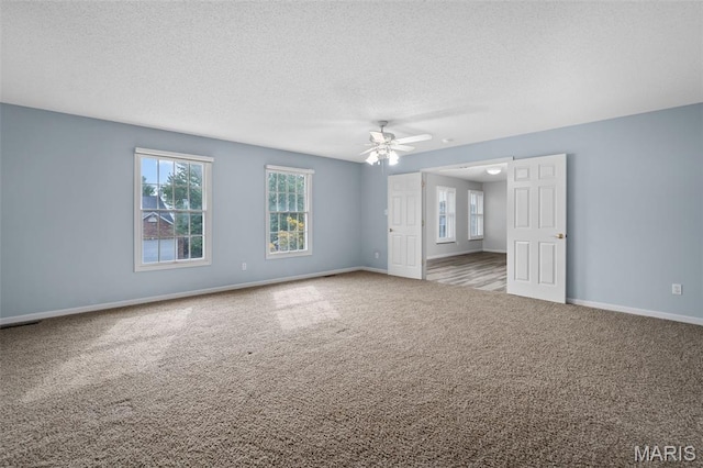 2849 Dardenne Links Dr, Dardenne Prairie, MO 63368 - carpeted empty room with ceiling fan and a textured ceiling