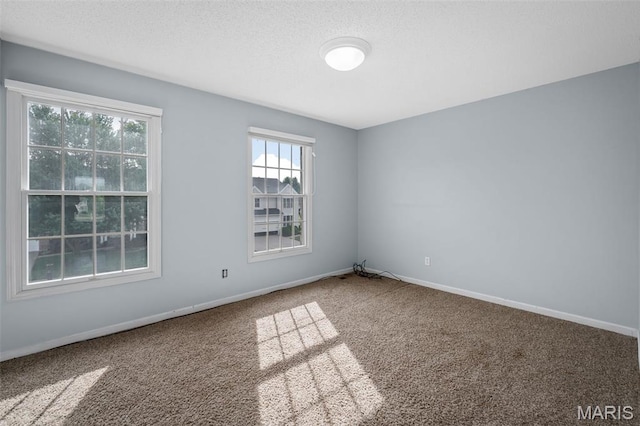 2849 Dardenne Links Dr, Dardenne Prairie, MO 63368 - carpeted spare room with a textured ceiling