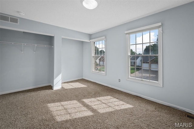 2849 Dardenne Links Dr, Dardenne Prairie, MO 63368 - unfurnished bedroom with a closet and carpet